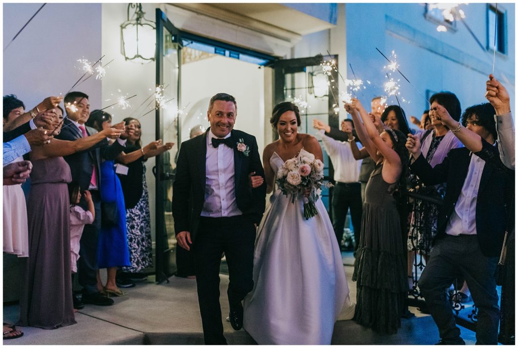 bride and groom leaving during sparkler exit
