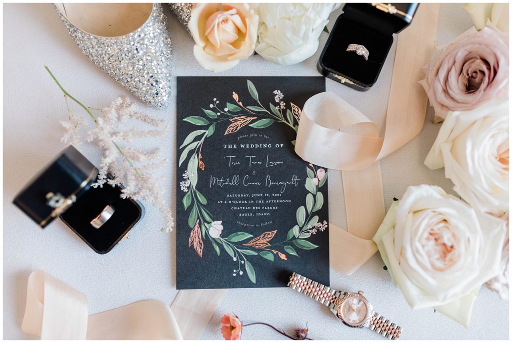 european chic wedding details with wedding invitation and bridal shoes
