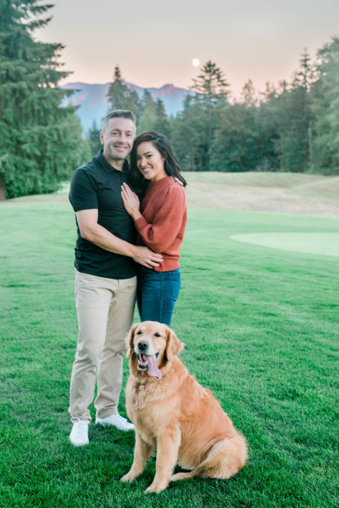 engaged couple hugging during outdoor golf course engagement session