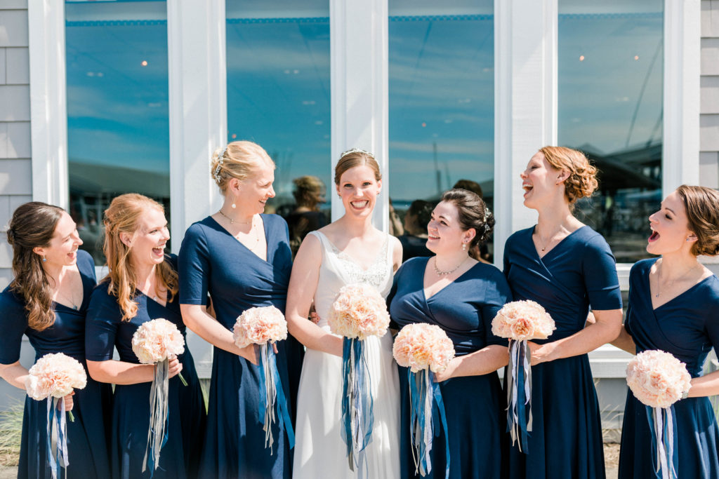 bride with bridesmaids on nautical wedding day