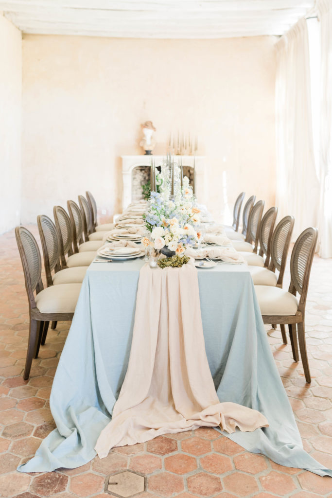 blue and cream wedding colors on a table setting in Boise Idaho wedding venue for a Spring wedding
