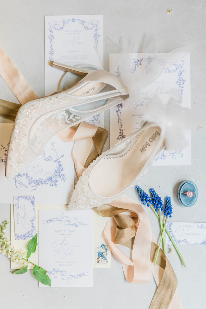 detail shot of spring wedding details of brides shoes, florals and other small details