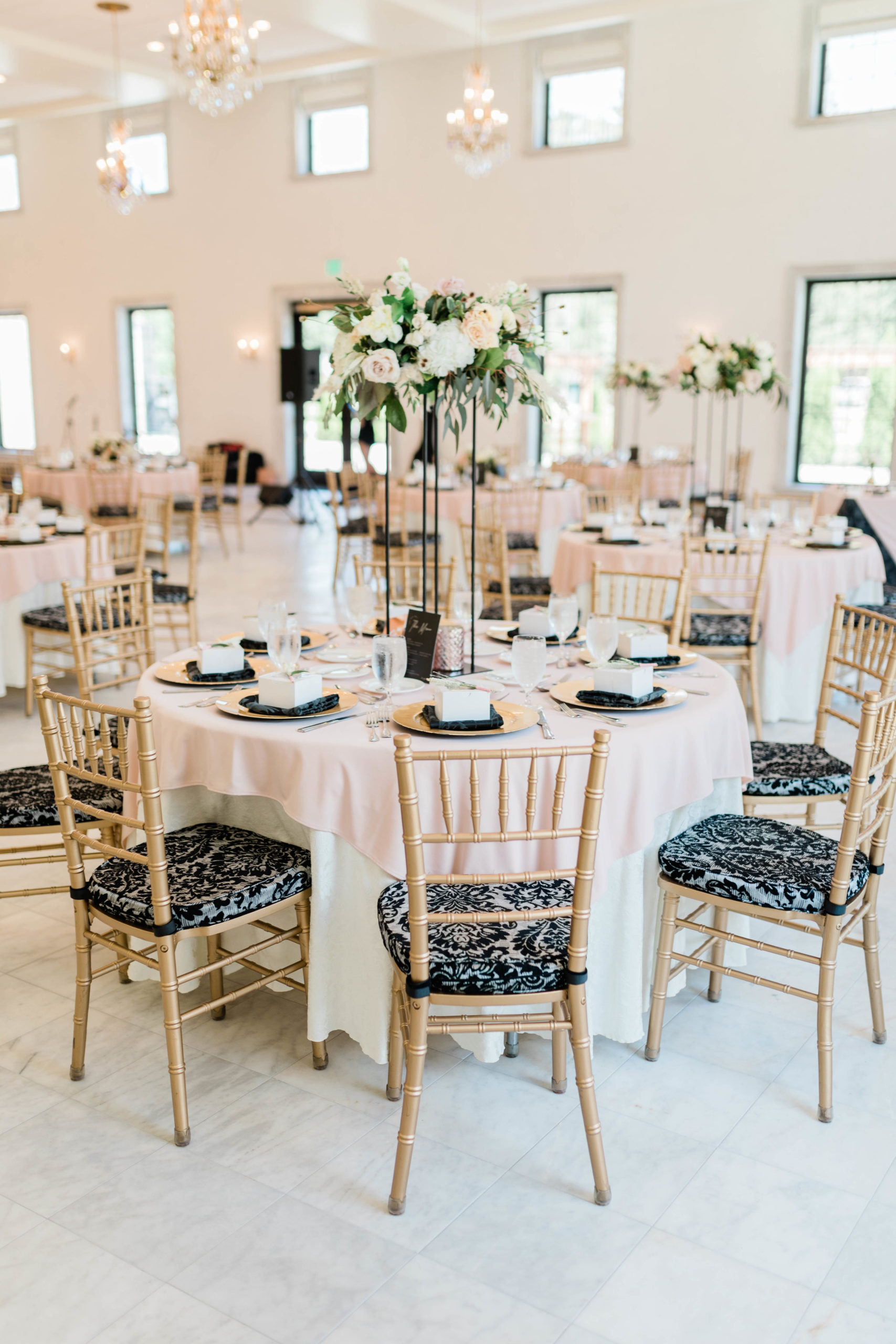 elegant indoor wedding venue in Boise with detail wedding tables and florals