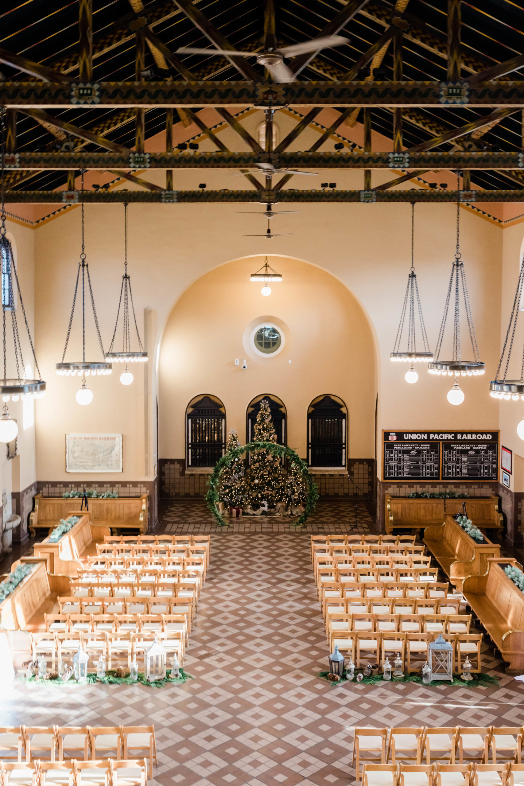 church wedding venue with chairs set up and lights on