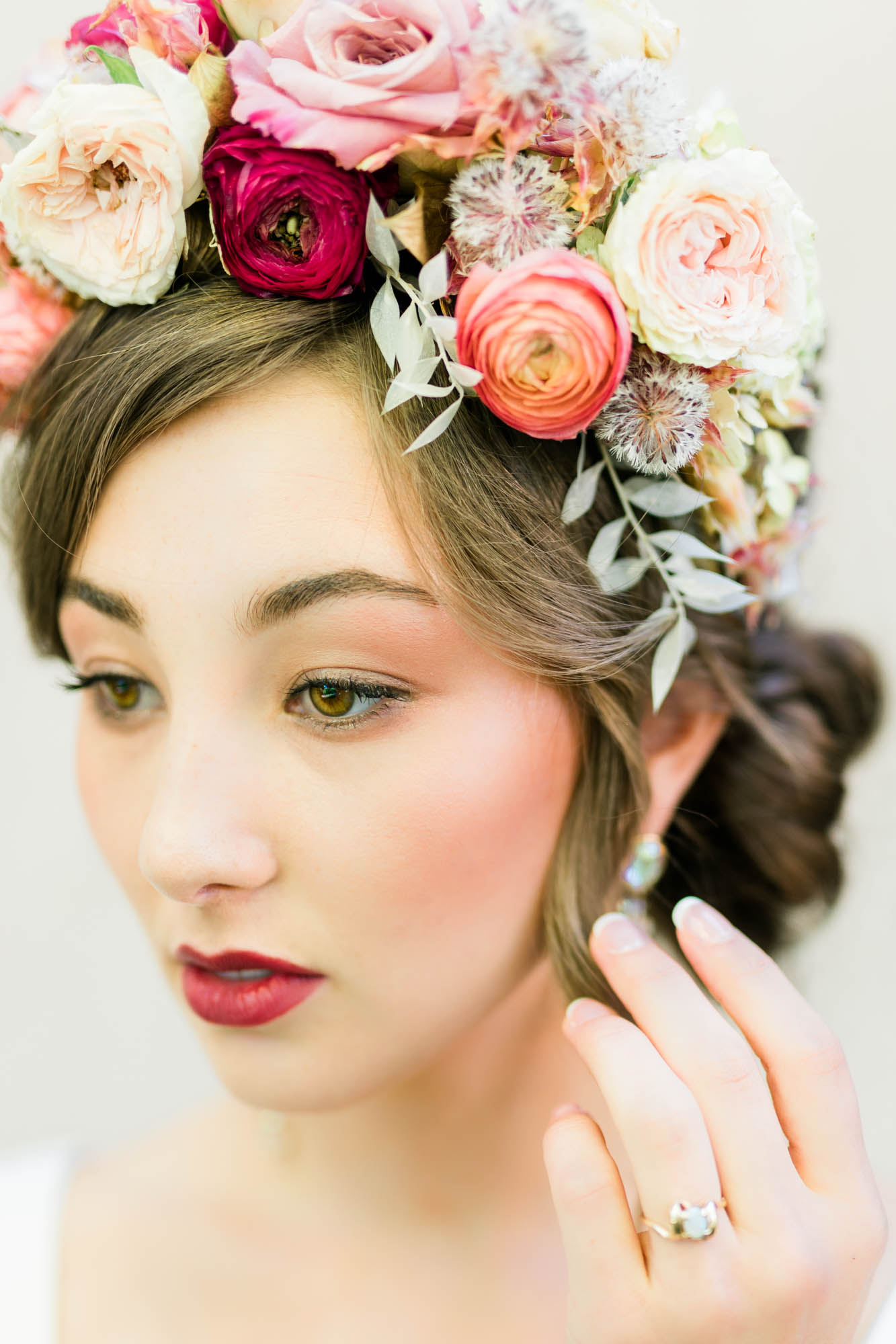 wedding hair with a floral crown on top