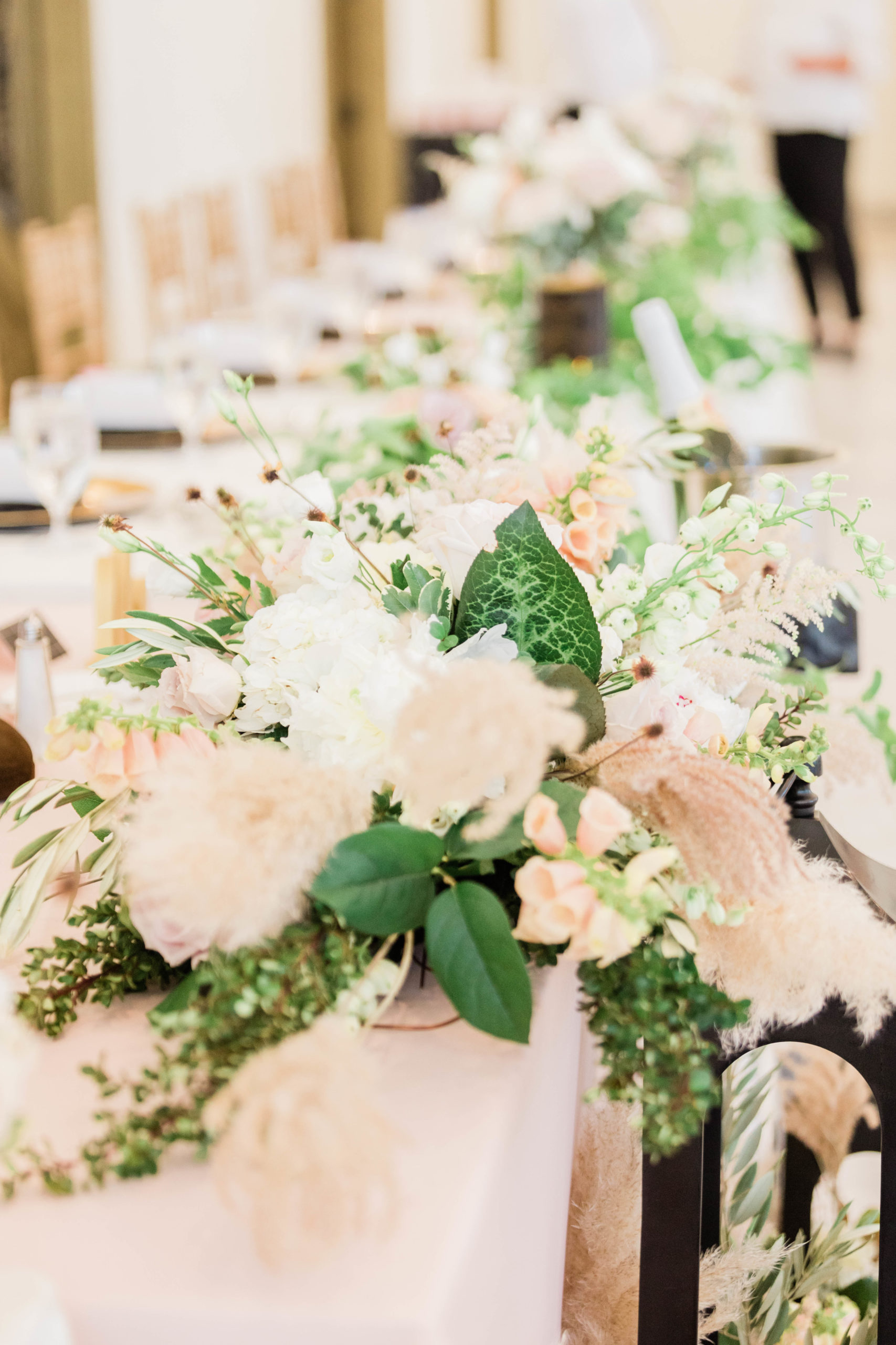 Boise Idaho wedding reception flowers acting as a centerpiece in the reception space with pink and cream florals
