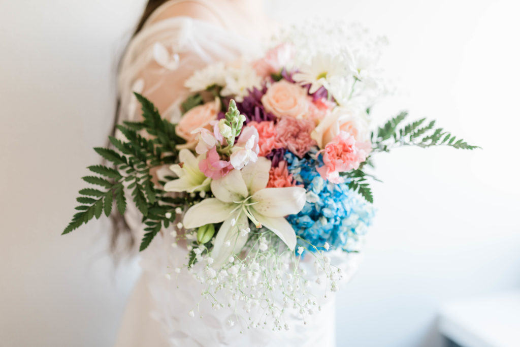 colorful bridal florals for a boho backyard wedding 