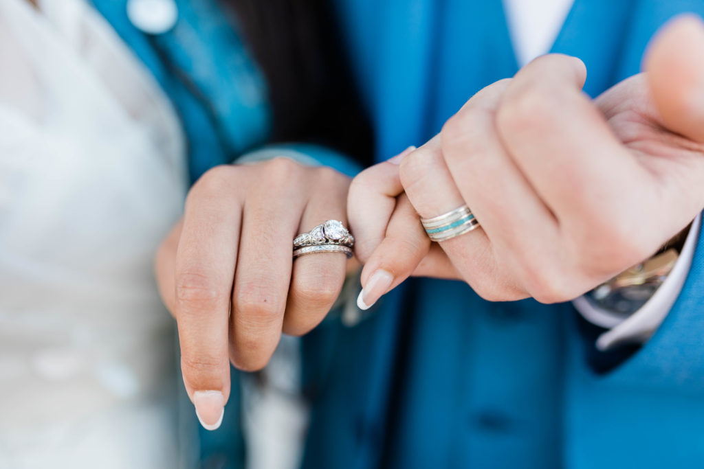Boise wedding photographer captures bride and groom linking pinkies 