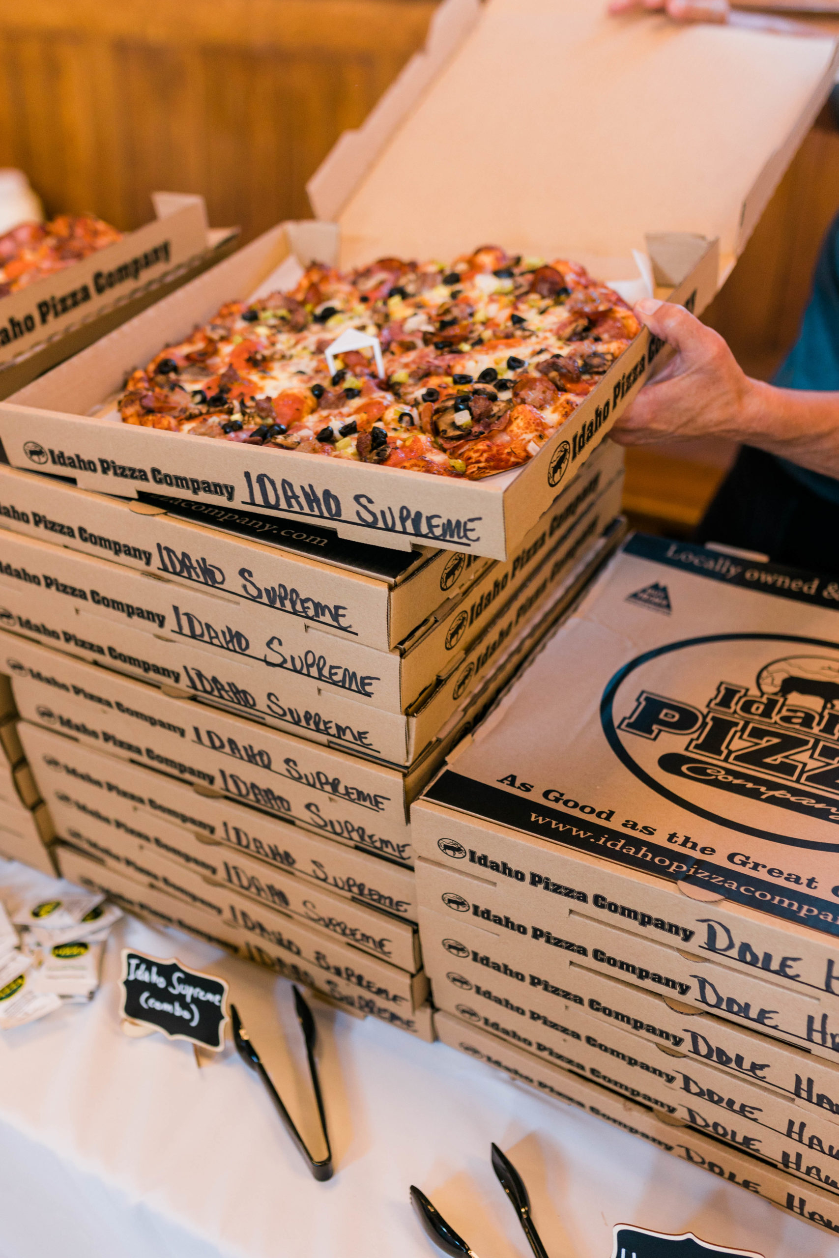 boxes of pizza at Boise wedding reception 