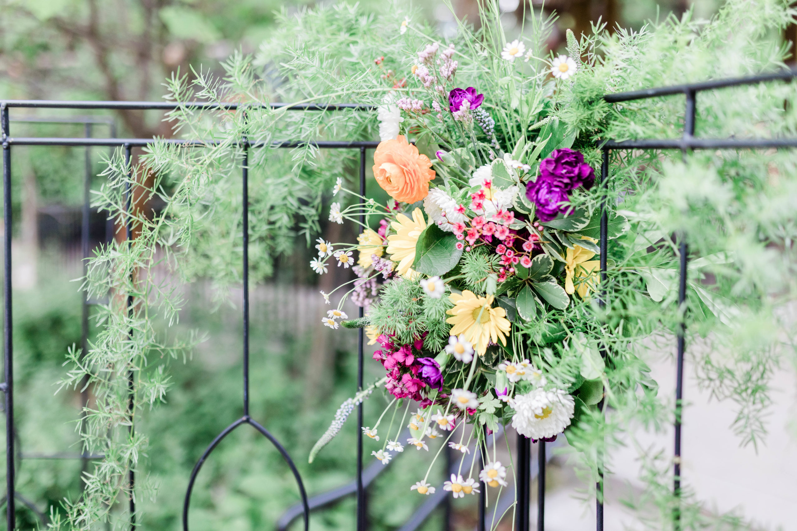 floral decor at wedding ceremony at colorful zoo wedding