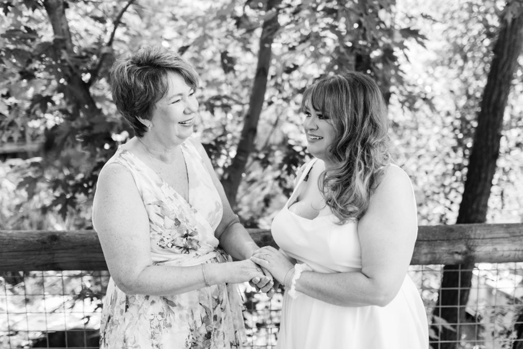 bride with mom on wedding day before wedding ceremony