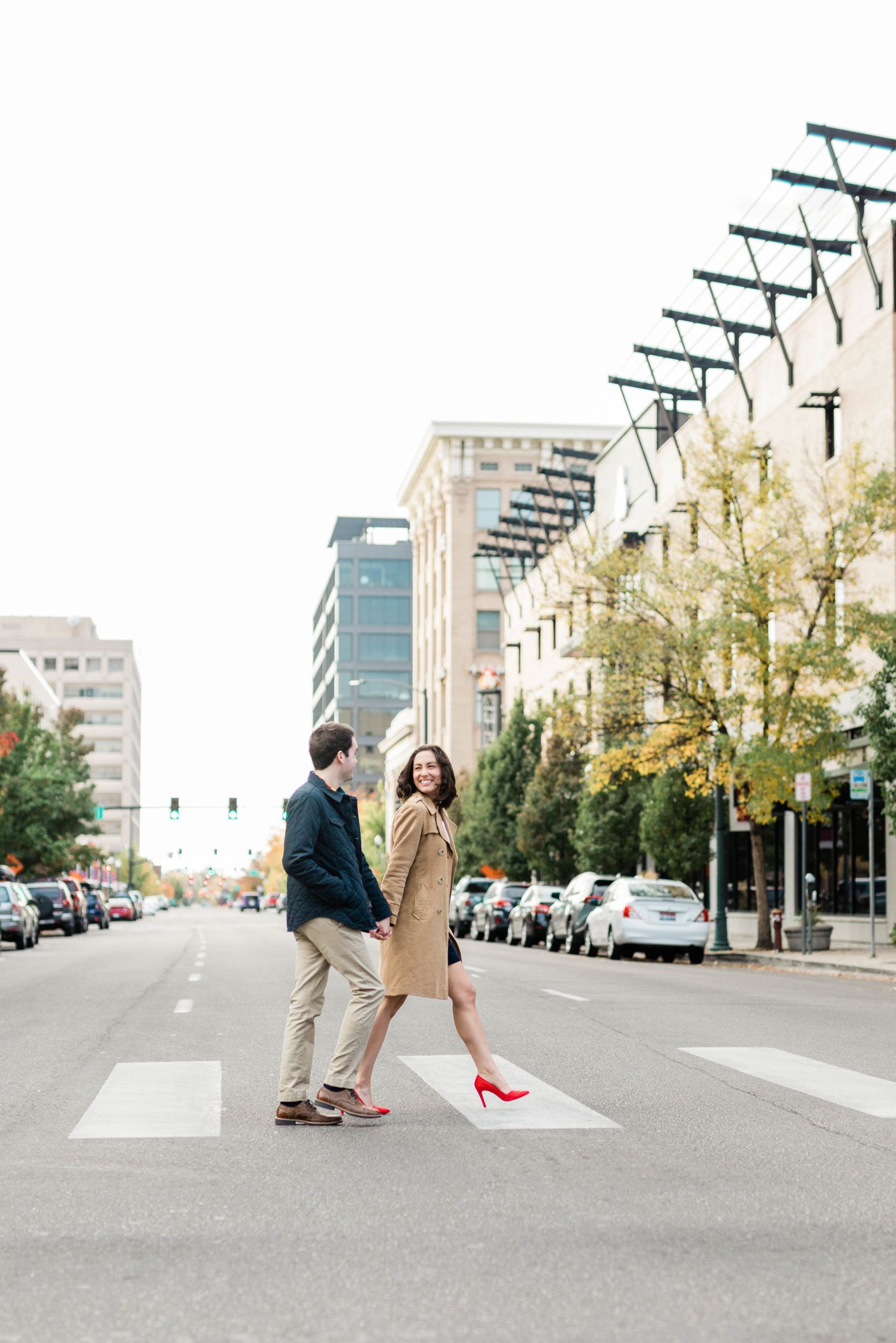 Boise wedding photographer captures couple walking in the streets in Boise