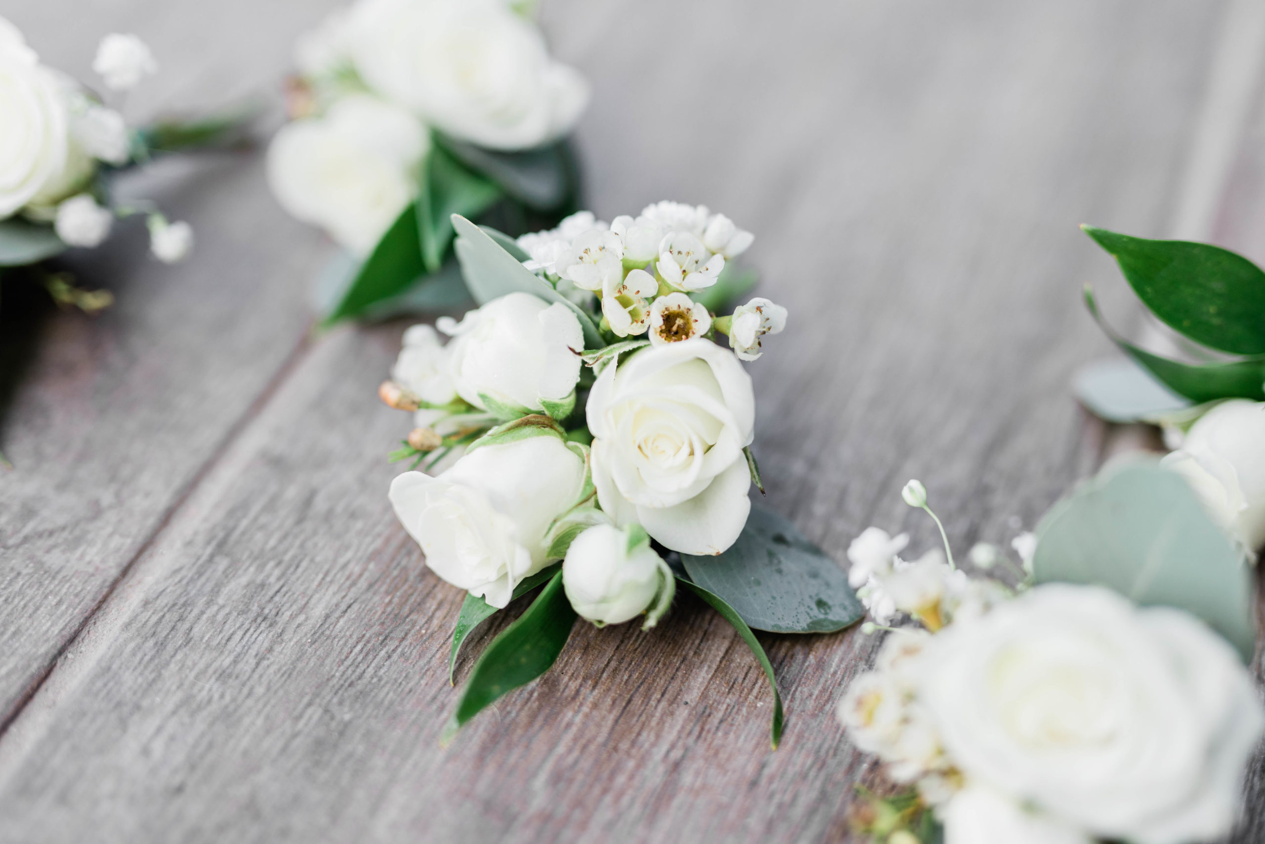 close up of white flower boutonnières