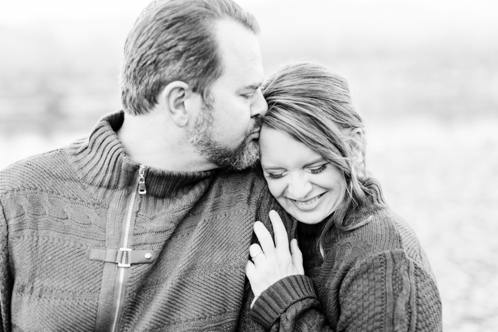 Boise wedding photographer captures man and woman hugging and smiling during fall engagements