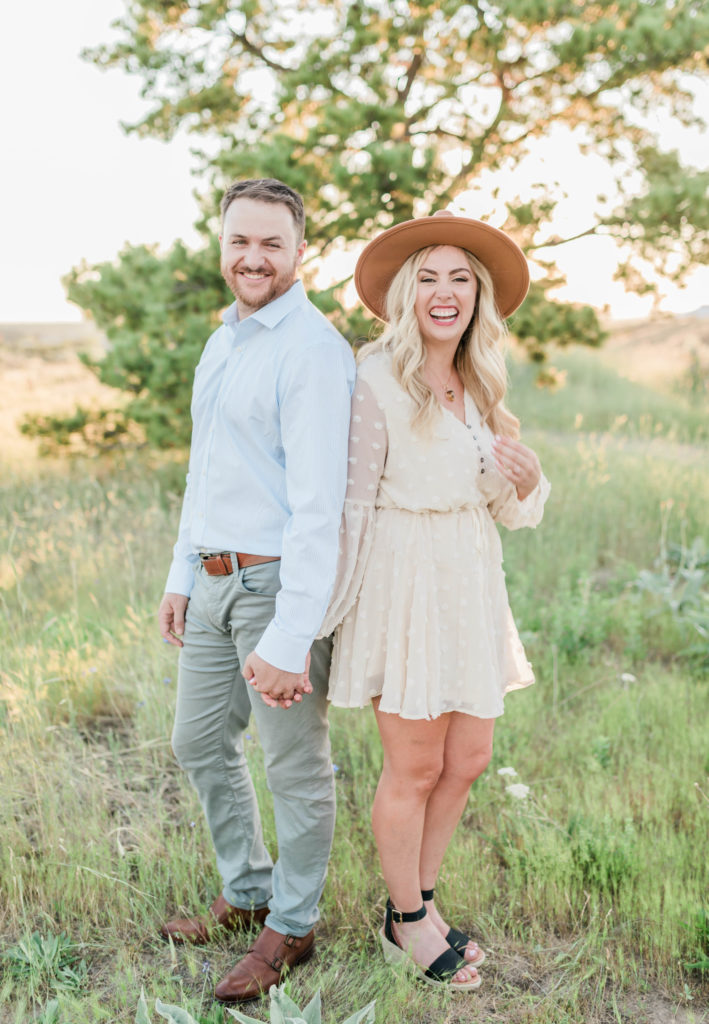 couple wearing neutral outfits during boise engagement photos