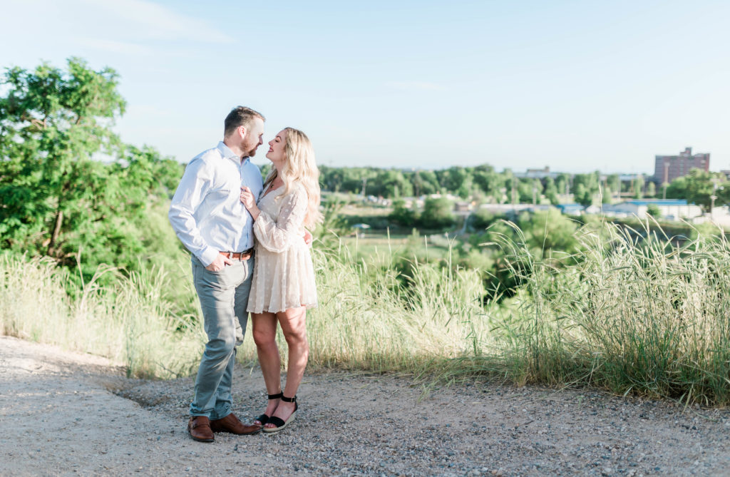 boise wedding photographer captures couple in grassy field