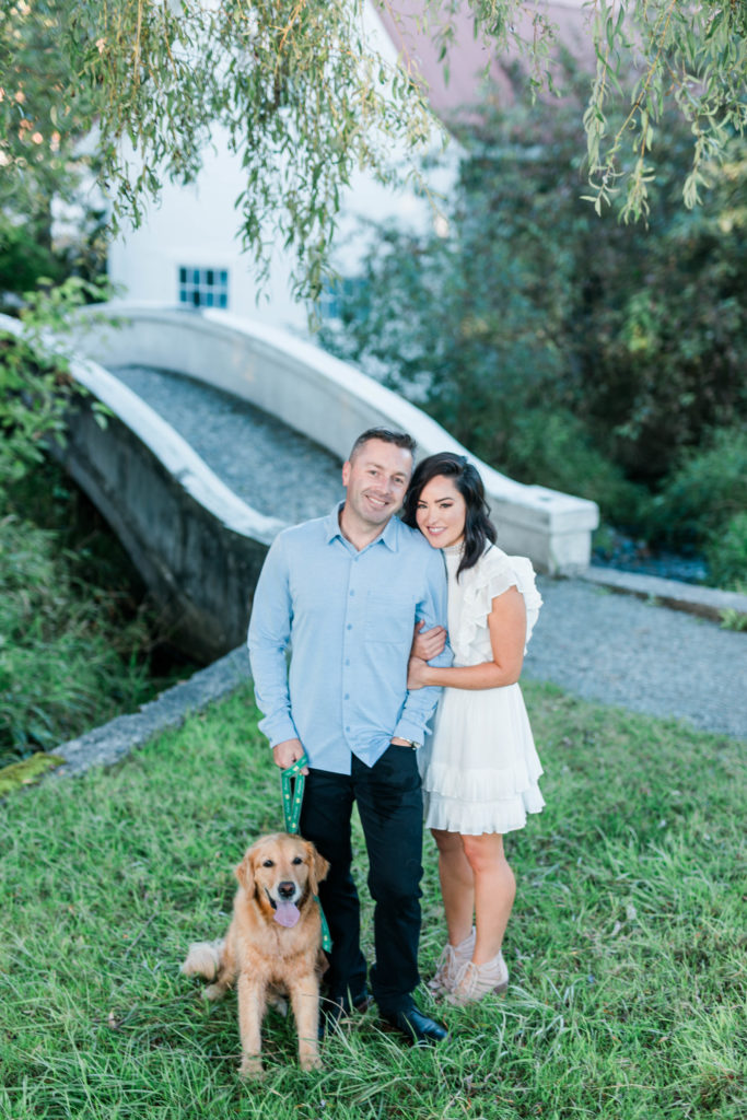Boise wedding photographer captures couple standing together with their dog