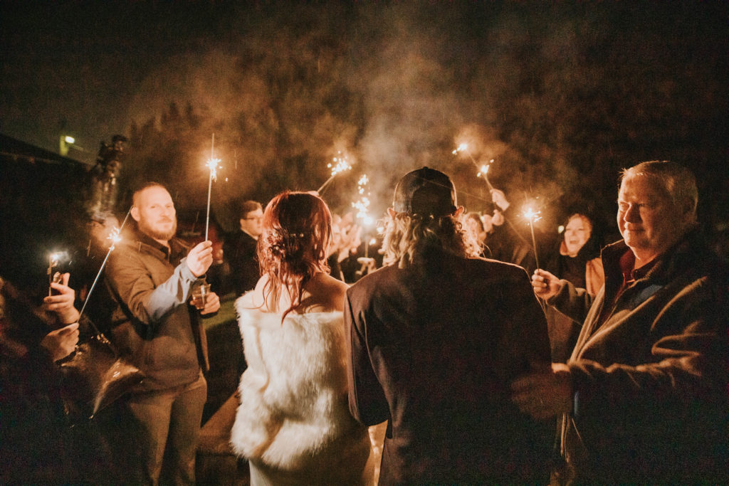 Boise wedding photographer captures couple walking sparkler exit