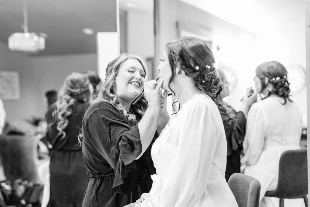 Boise wedding photographers capture bride getting ready for boise wedding in black and white portrait