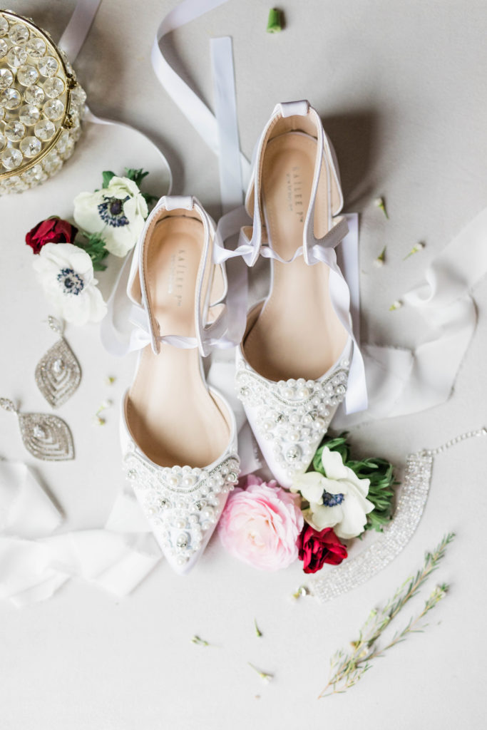 Boise wedding photographers capture bridal shoes, flowers, and jewelry