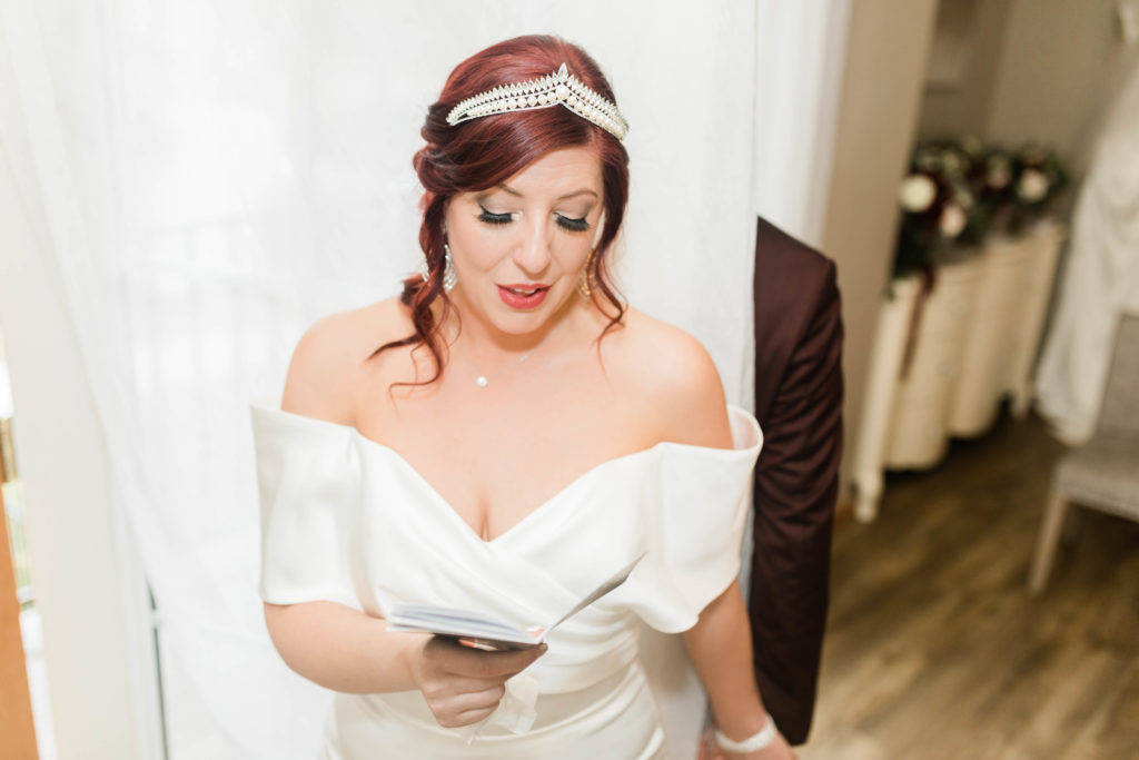 Boise wedding photographers capture bride reading vows in private vow reading