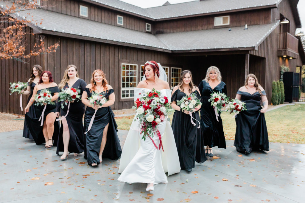 Boise wedding photographer captures bride walking with bridesmaids 