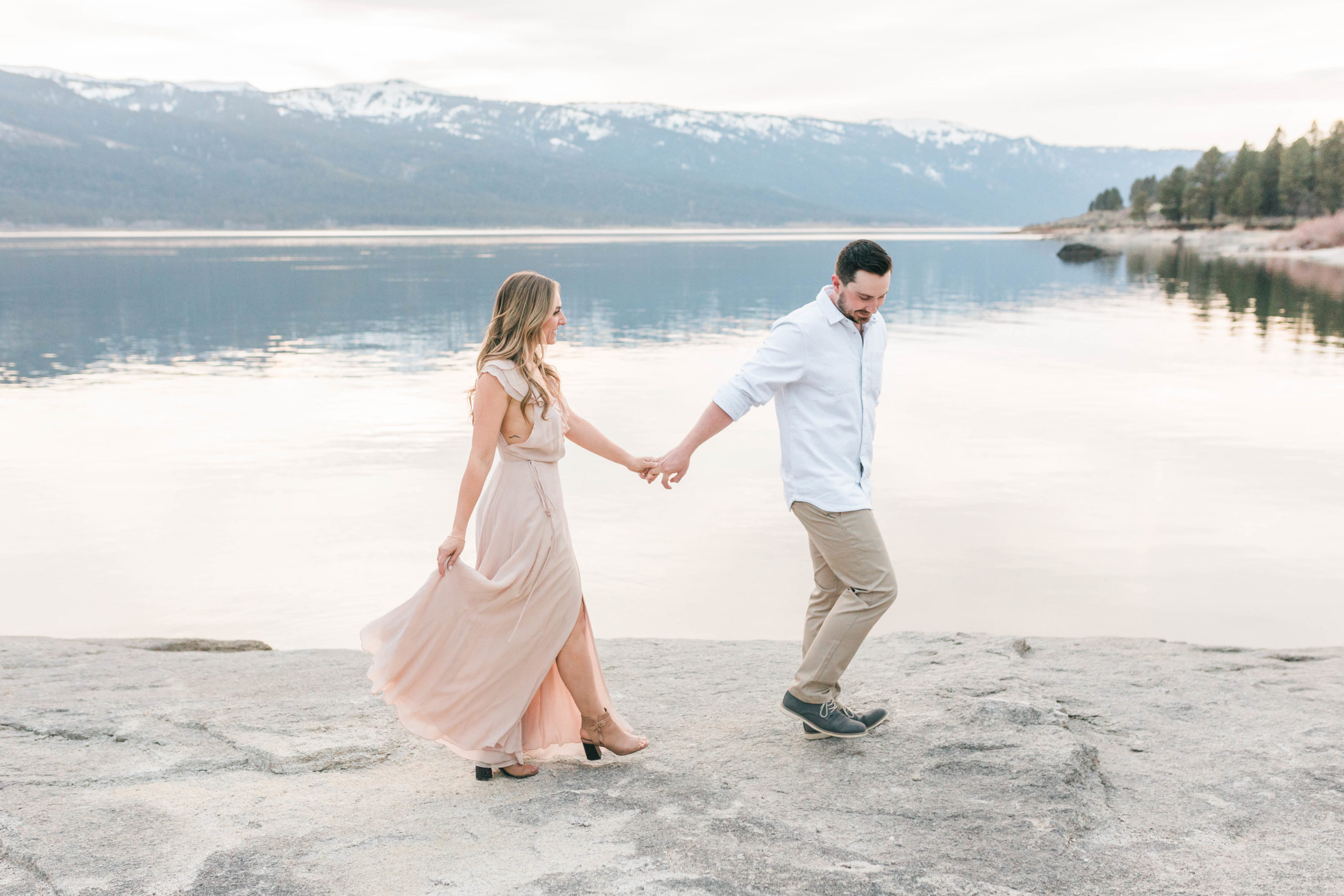 Boise wedding photographer captures couple holding hands and walking together