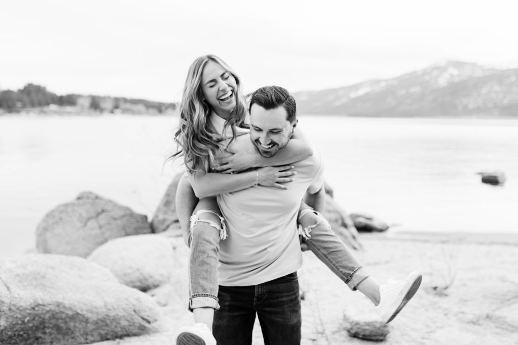 Boise wedding photographer captures woman and man laughing together during engagement session