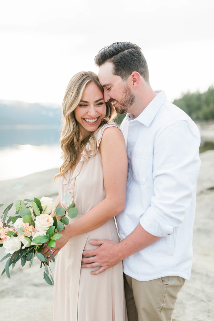 Boise wedding photographer captures man hugging woman and whispering in her ear