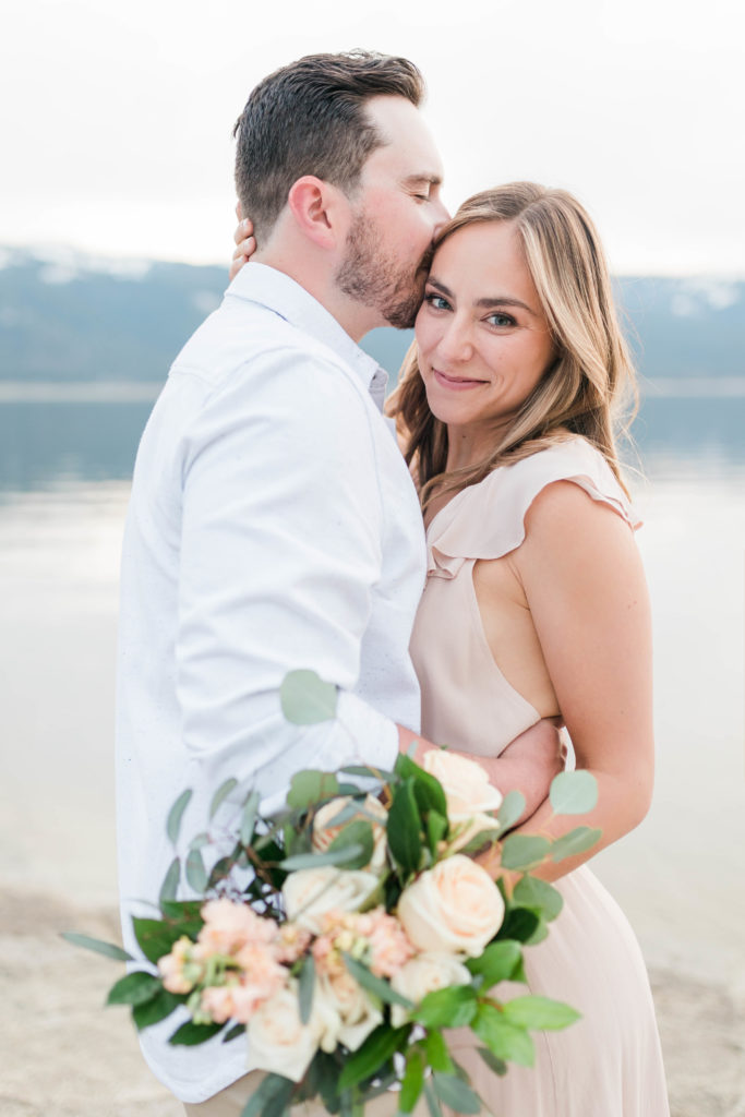 Boise wedding photographer captures man kissing woman's forehead
