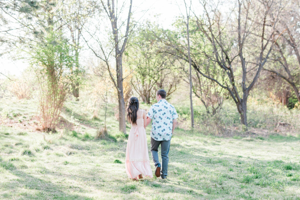 Boise wedding photographer captures couple walking away together holding hands