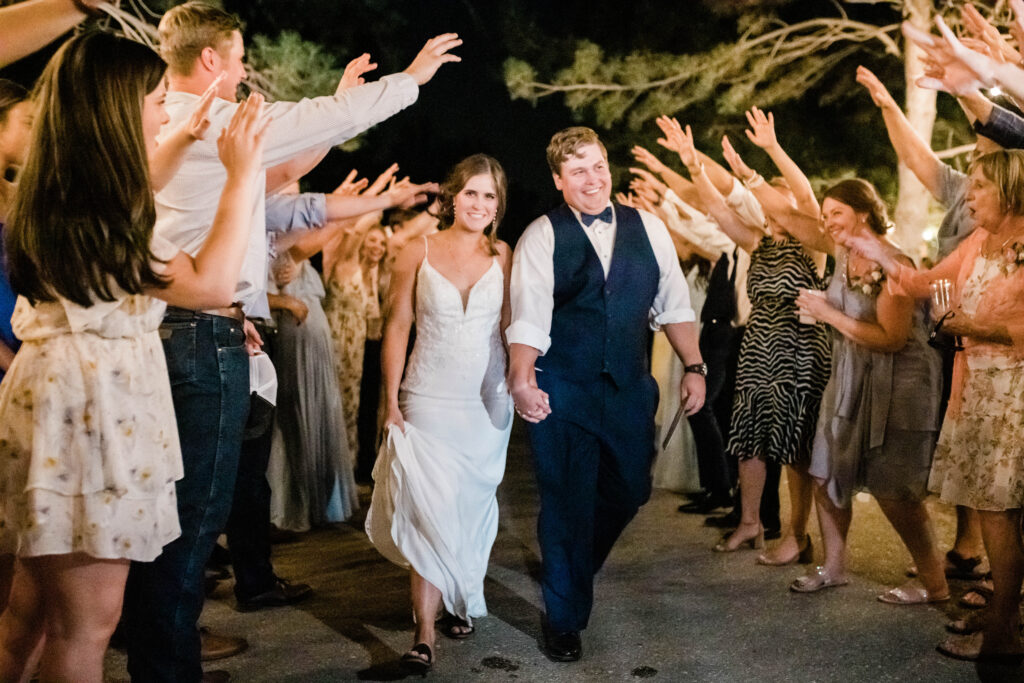 Boise wedding photographer captures couple exiting wedding ceremony