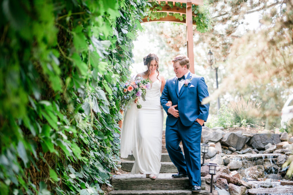 Boise wedding photographer captures bride and groom walking together after first look