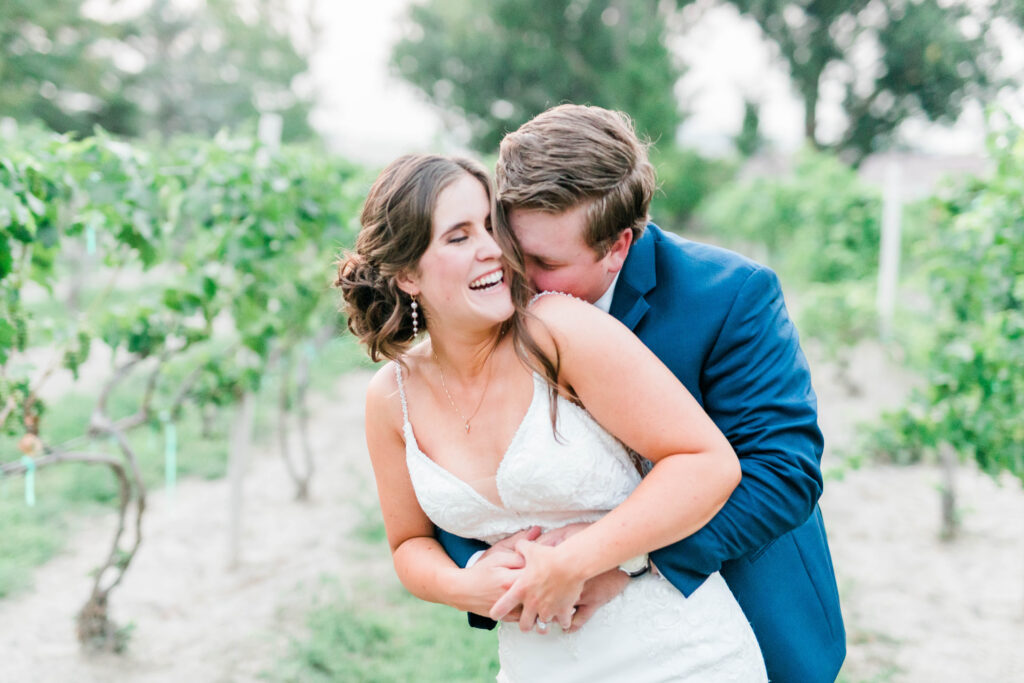 Boise wedding photographer captures couple hugging at Boise wedding venue