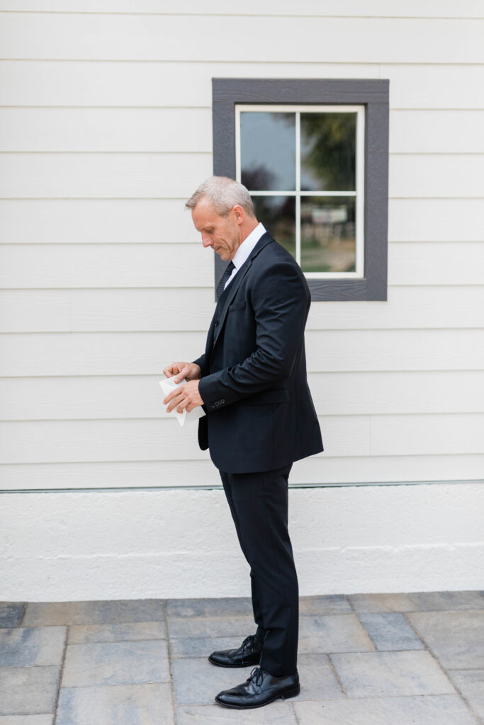 Boise wedding photographer captures bride's father waiting for bride before first look
