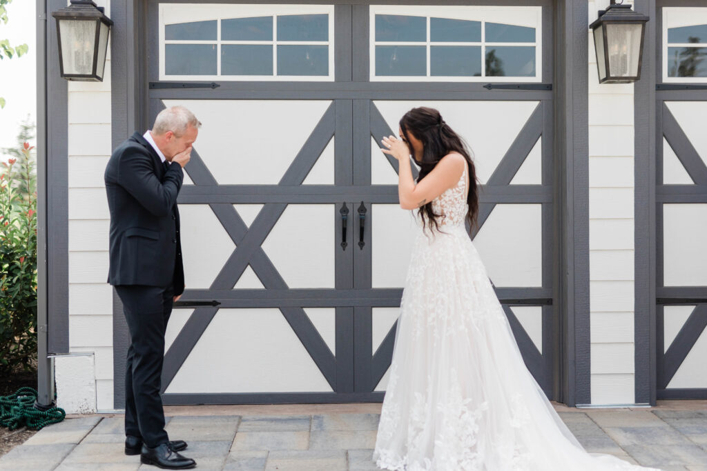 bride seeing father for first time on wedding day captured by Boise wedding photographer