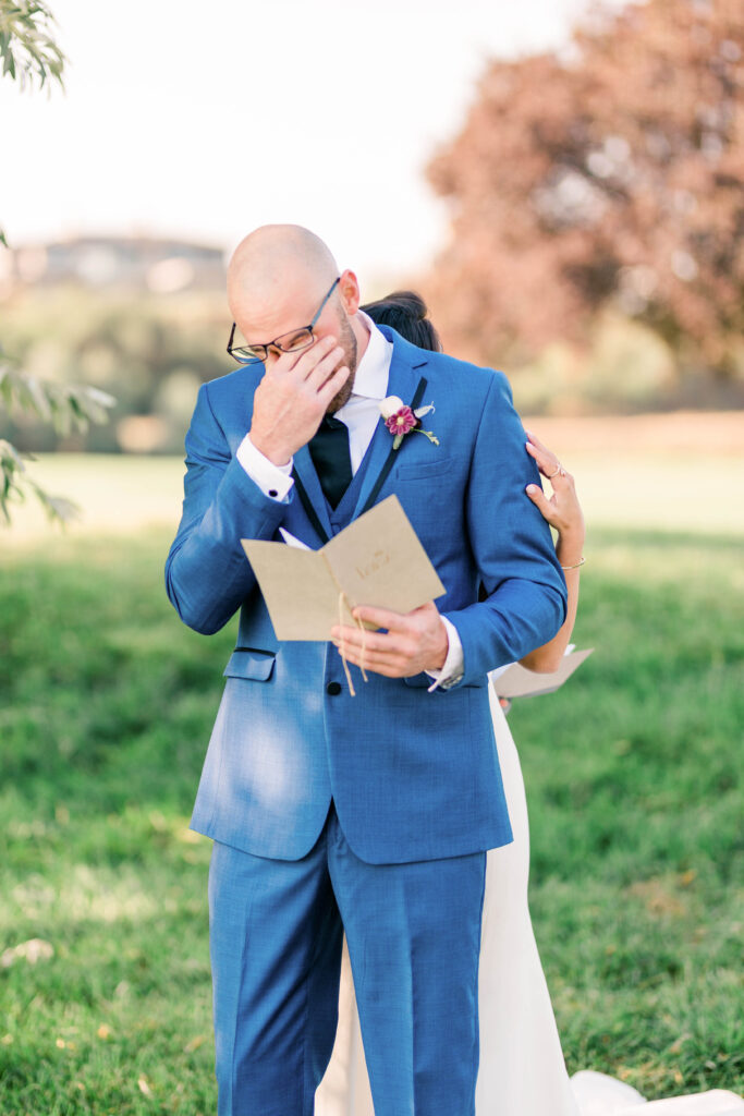 Boise wedding photographer captures groom getting emotional during private vow reading